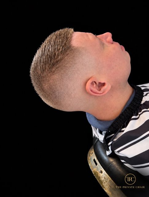 A high skin fade, from the side